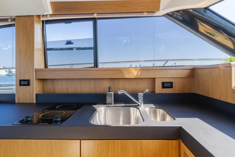 Special Place Yacht Photos Pics Modern kitchen interior on 2019 Bavaria Virtess 420 yacht with sleek design and ocean view.