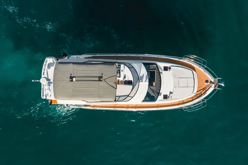 Special Place Yacht Photos Pics Aerial view of 2019 Bavaria Virtess 420 yacht on clear blue water.