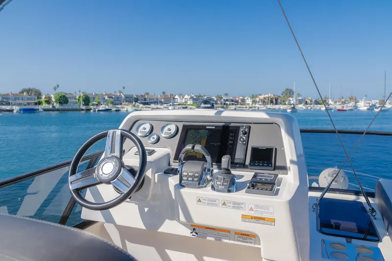 Special Place Yacht Photos Pics Helm of 2019 Bavaria Virtess 420 yacht with scenic marina view.