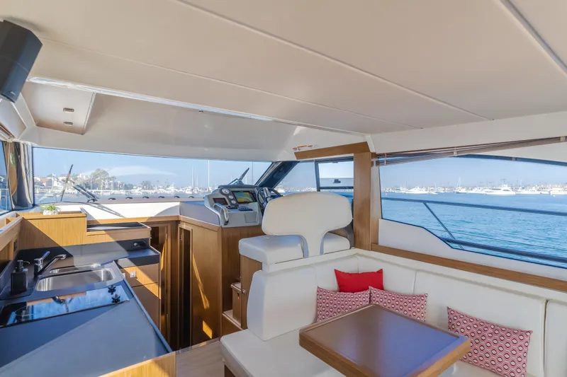 Special Place Yacht Photos Pics Interior of 2019 Bavaria Virtess 420 yacht with modern kitchen and seating area.