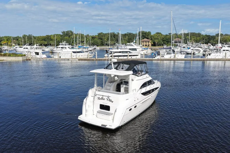 Bella Vita Yacht Photos Pics 2008 Meridian 408 Motoryacht in marina, surrounded by other boats under a clear sky.
