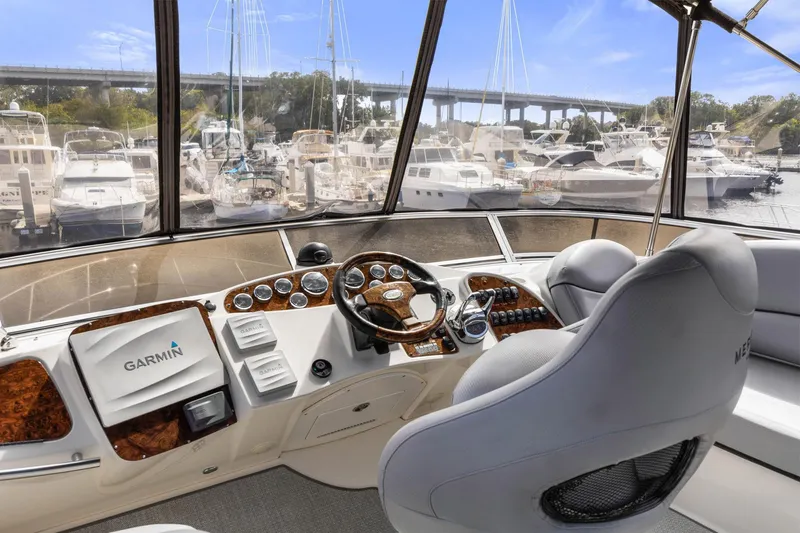 Bella Vita Yacht Photos Pics Helm of 2008 Meridian 408 Motoryacht with Garmin navigation, overlooking marina.