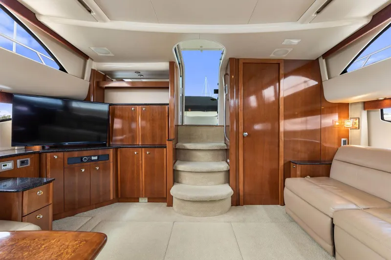 Bella Vita Yacht Photos Pics Luxurious interior of 2008 Meridian 408 Motoryacht with wood finishes and modern amenities.