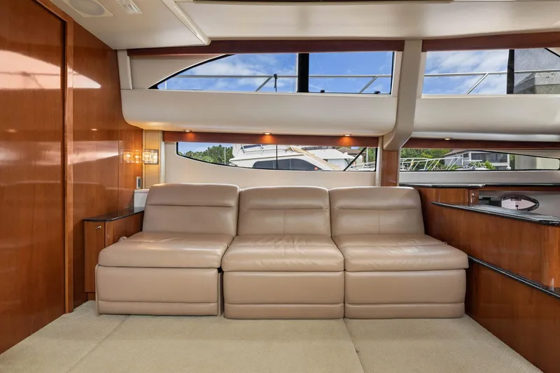 Bella Vita Yacht Photos Pics Luxurious interior of 2008 Meridian 408 Motoryacht with leather seating and panoramic windows.