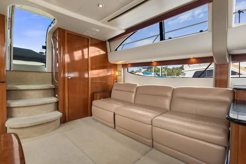 Bella Vita Yacht Photos Pics Luxurious interior of 2008 Meridian 408 Motoryacht with plush seating and elegant wood finishes.