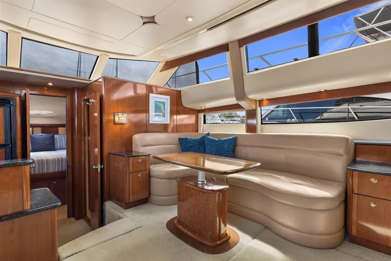 Bella Vita Yacht Photos Pics Luxurious interior of 2008 Meridian 408 Motoryacht with elegant seating and wood finishes.