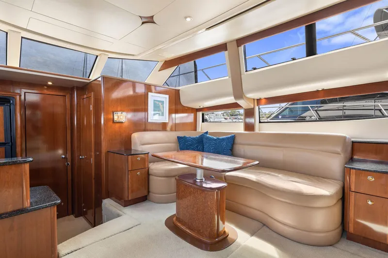Bella Vita Yacht Photos Pics Luxurious interior of 2008 Meridian 408 Motoryacht with elegant seating and wood finishes.