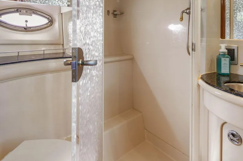 Bella Vita Yacht Photos Pics Bathroom interior of 2008 Meridian 408 Motoryacht with shower and sink.