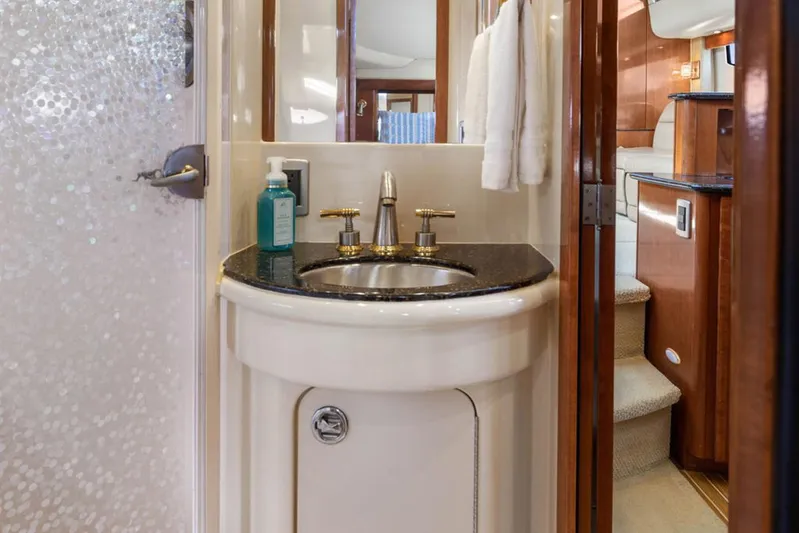 Bella Vita Yacht Photos Pics Luxurious bathroom in 2008 Meridian 408 Motoryacht with elegant sink and modern fixtures.