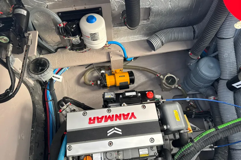 Alter Ego Yacht Photos Pics Engine room of 2023 Catana 50 Ocean Class yacht with Yanmar engine and various components.