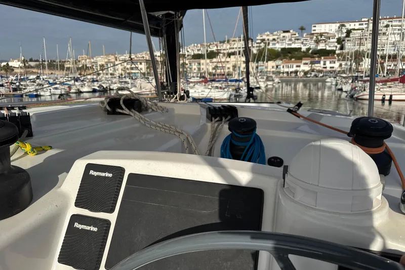 Alter Ego Yacht Photos Pics Cockpit view of 2023 Catana 50 Ocean Class yacht in marina setting.