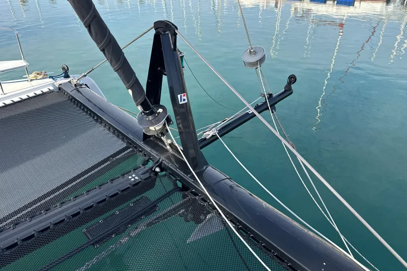 Alter Ego Yacht Photos Pics 2023 Catana 50 Ocean Class catamaran deck with rigging and netting.