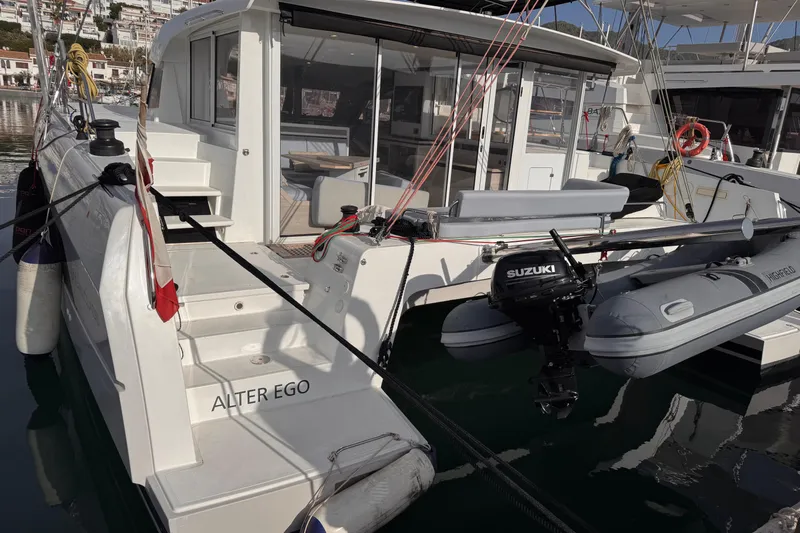 Alter Ego Yacht Photos Pics 2023 Catana 50 Ocean Class yacht docked with inflatable boat and Suzuki motor.