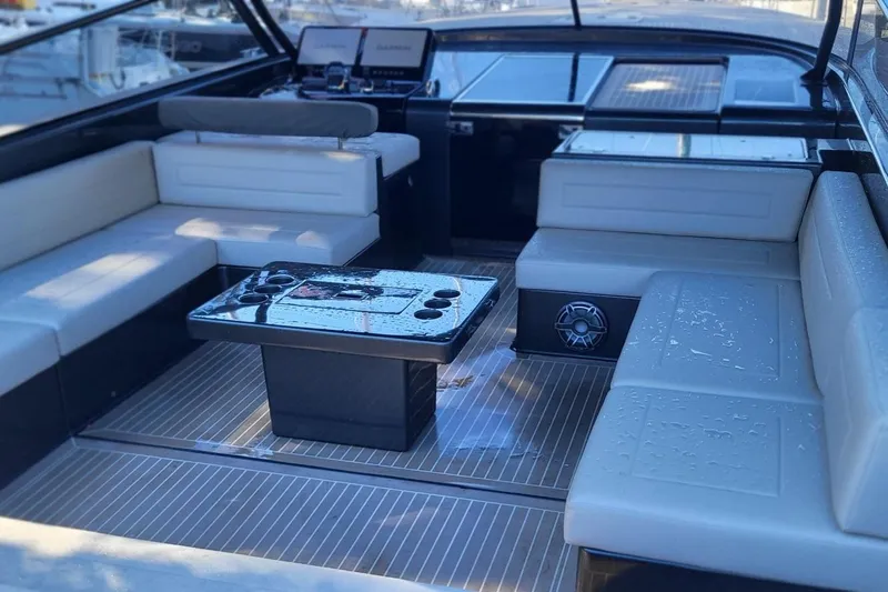  Yacht Photos Pics Luxurious interior of 2023 VanDutch 56 yacht with sleek seating and modern design.