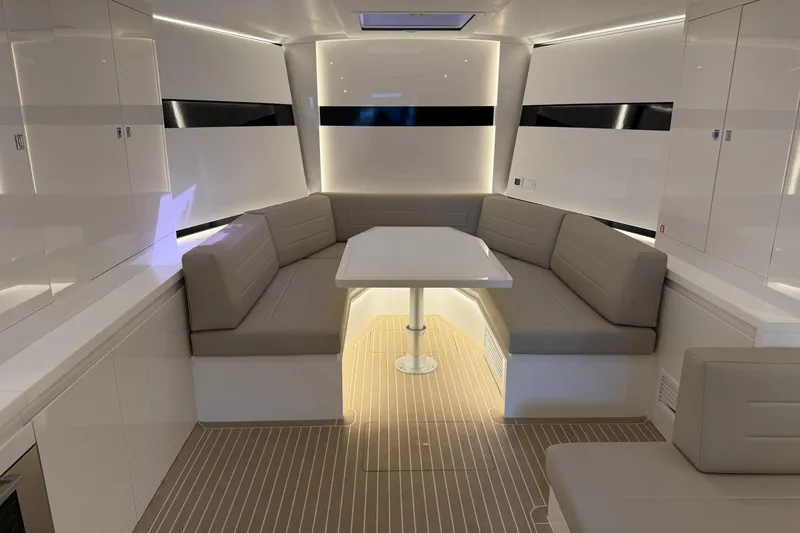  Yacht Photos Pics Luxurious interior of 2023 VanDutch 56 yacht with sleek seating and modern design.