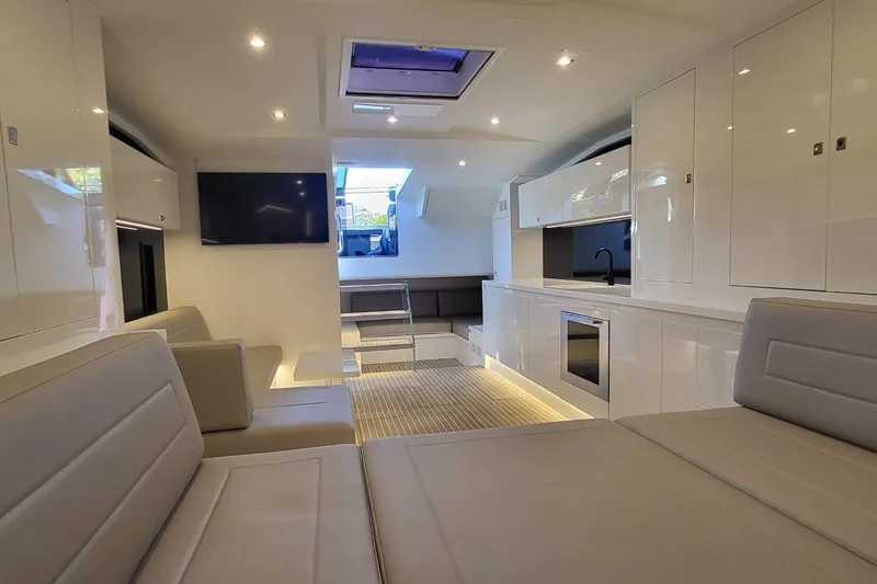  Yacht Photos Pics Luxurious interior of 2023 VanDutch 56 yacht with modern furnishings and sleek design.