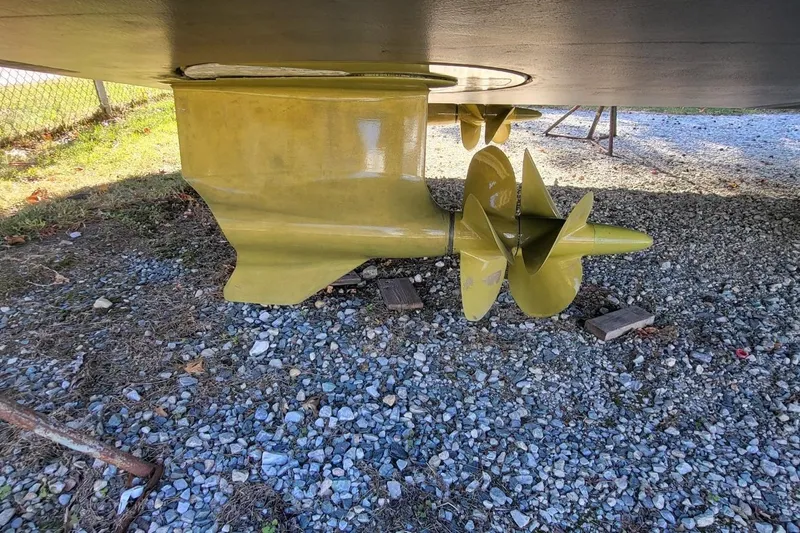  Yacht Photos Pics Underwater view of 2023 VanDutch 56 yacht propeller on gravel surface.