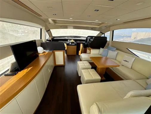  Yacht Photos Pics Luxurious interior of a 2008 Pershing 64' yacht with modern furnishings.