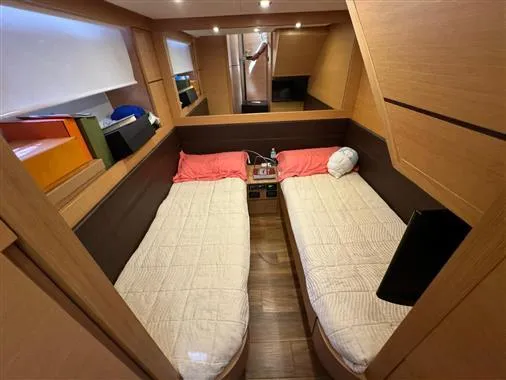  Yacht Photos Pics Twin cabin interior of 2008 Pershing 64' yacht with modern wooden finish.