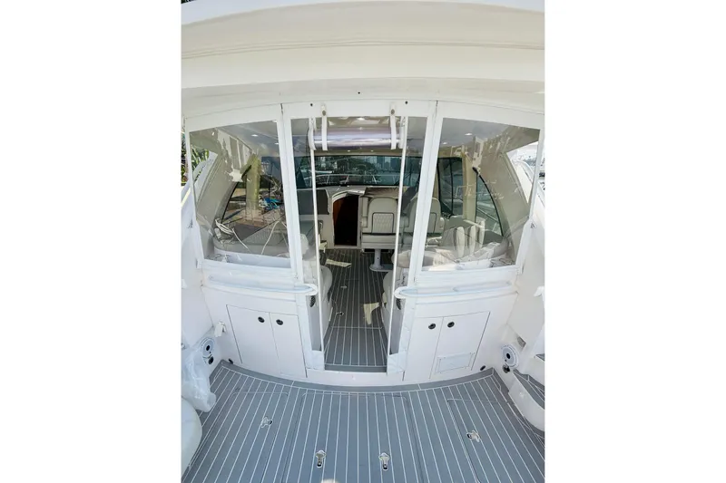  Yacht Photos Pics 2021 Intrepid 410 Evolution yacht interior with sleek design and modern seating.