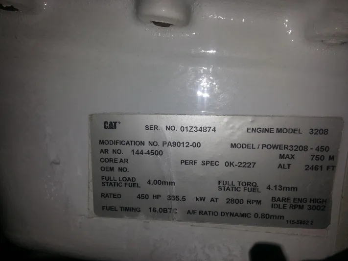  Yacht Photos Pics Engine specification plate for CAT 3208, detailing model, power, and performance metrics.