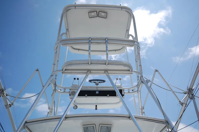  Yacht Photos Pics 2001 Cabo 35 Express boat tower against a clear blue sky.