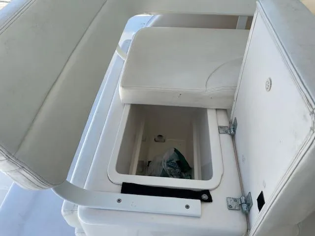 Mae Yacht Photos Pics 2005 Tiara Yachts 3200 seat storage compartment with open lid.