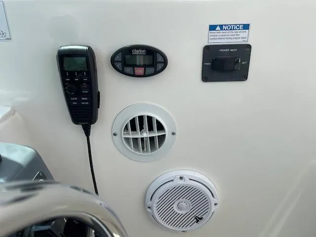 Mae Yacht Photos Pics Control panel of a 2005 Tiara Yachts 3200 with communication and audio equipment.