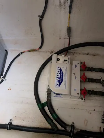 Mae Yacht Photos Pics Engine compartment of a 2005 Tiara Yachts 3200 with Reverso oil change system.