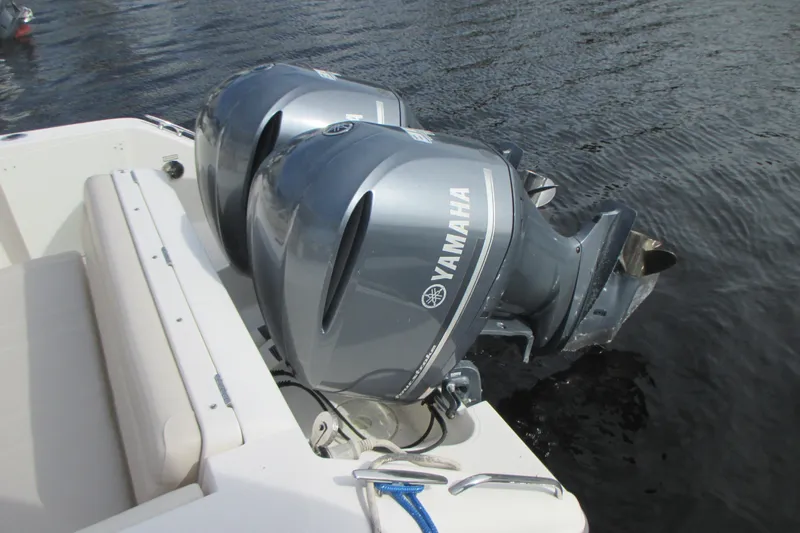  Yacht Photos Pics 2013 Pursuit ST 310 Sport with Yamaha outboard engines on water.