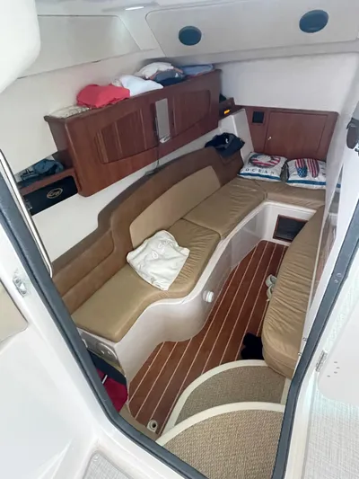  Yacht Photos Pics Interior cabin of 2014 Grady-White Freedom 375 boat with seating and storage.
