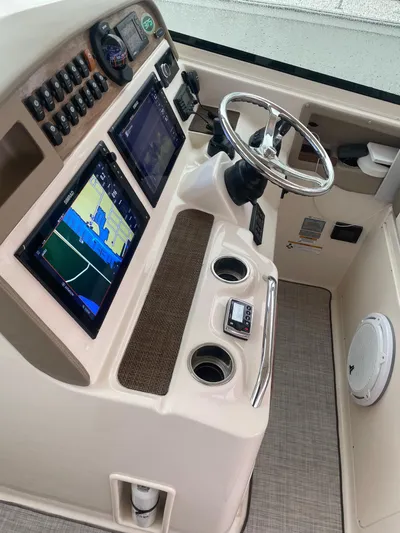  Yacht Photos Pics 2014 Grady-White Freedom 375 helm with dual navigation screens and steering wheel.