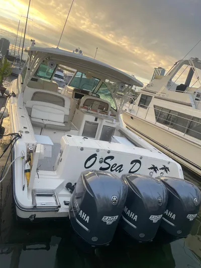  Yacht Photos Pics 2014 Grady-White Freedom 375 boat docked with triple Yamaha engines.