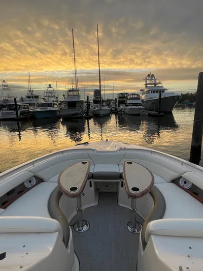  Yacht Photos Pics 2014 Grady-White Freedom 375 boat docked at sunset with other boats in the background.