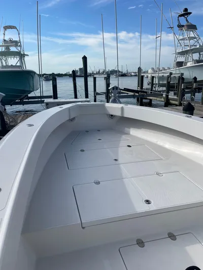 Yacht Photos Pics 2013 Bahama 41 Open boat docked, showcasing spacious deck and clear sky.