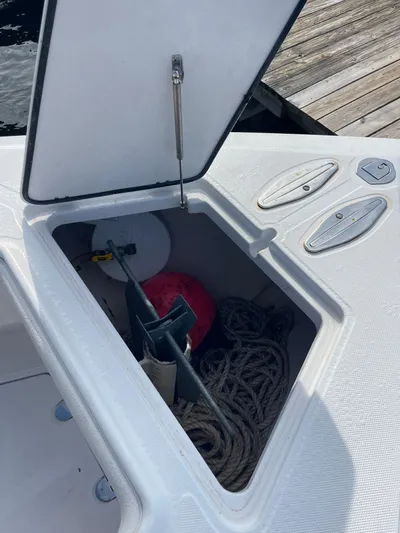  Yacht Photos Pics Open storage compartment on 2013 Bahama 41 Open boat with ropes and equipment.