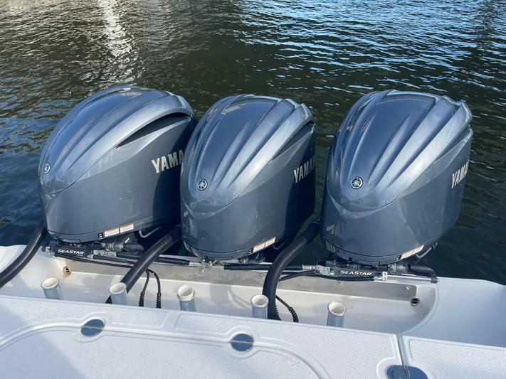  Yacht Photos Pics Three Yamaha outboard motors on a 2013 Bahama 41 Open boat.