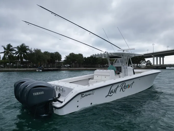  Yacht Photos Pics 2013 Bahama 41 Open boat with Yamaha engines on water, overcast sky.