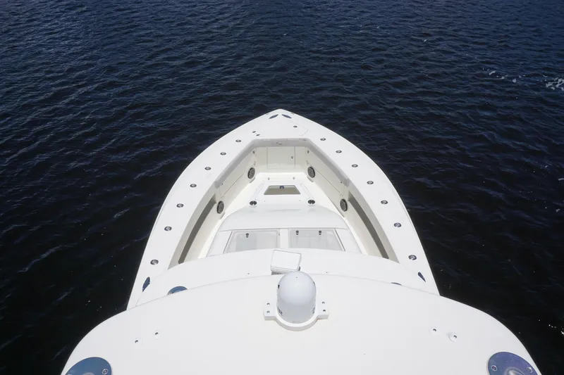  Yacht Photos Pics Bow view of 2015 SeaVee 430 FA boat on calm water.