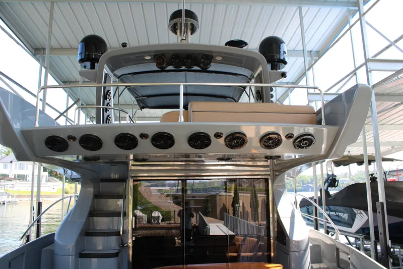  Yacht Photos Pics Azimut 50 yacht, 2006 model, docked under a covered marina.