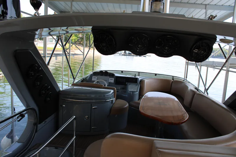  Yacht Photos Pics Interior view of 2006 Azimut 50 yacht with seating and table.