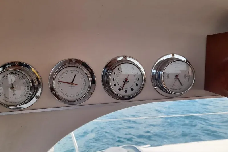 Sillage Yacht Photos Pics Gauges on a 2002 Lagoon 380 catamaran, with ocean view in the background.