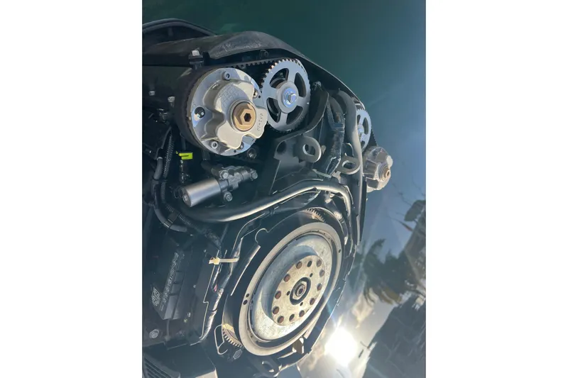  Yacht Photos Pics Close-up of a 2003 Contender 27 Open boat engine components.