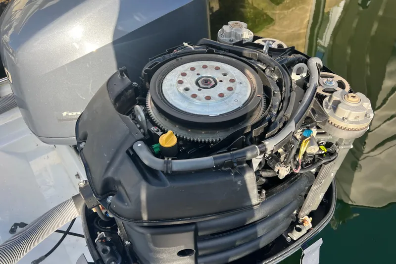  Yacht Photos Pics 2003 Contender 27 Open boat engine, detailed view of mechanical components.