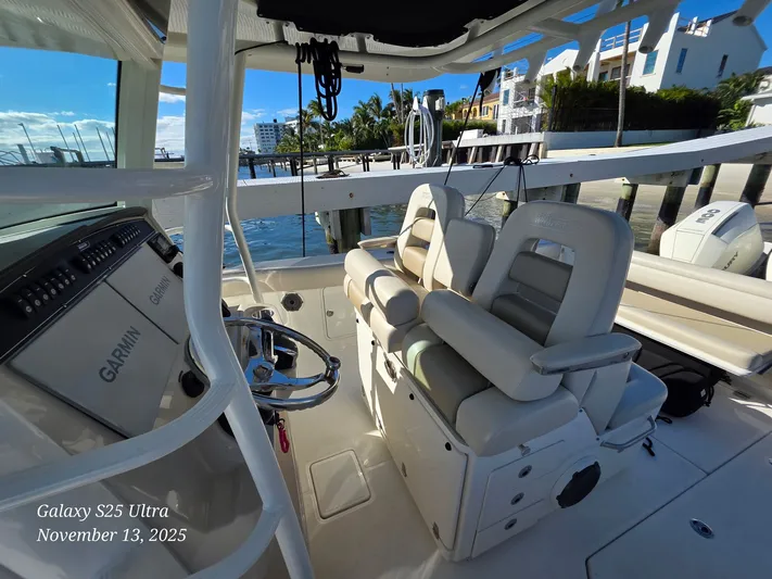  Yacht Photos Pics Interior of 2022 Boston Whaler 330 Outrage boat with Garmin navigation system.