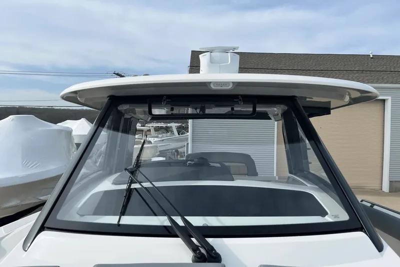  Yacht Photos Pics 2025 Boston Whaler 350 Realm boat windshield and roof detail.