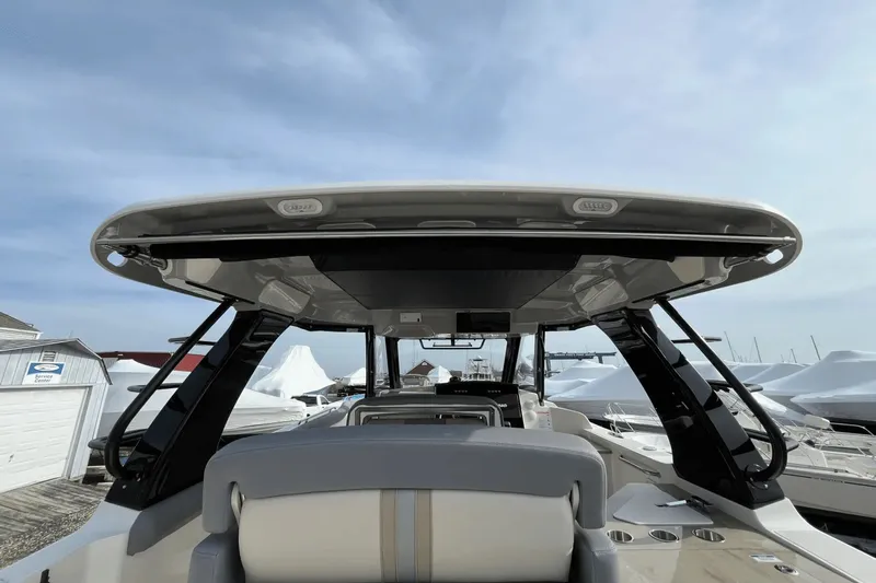  Yacht Photos Pics 2025 Boston Whaler 350 Realm boat interior with sleek design and modern features.