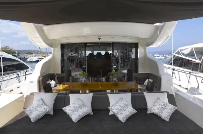 Eclat Yacht Photos Pics Luxurious 2008 Arno Leopard 31 yacht with elegant outdoor seating and dining area.