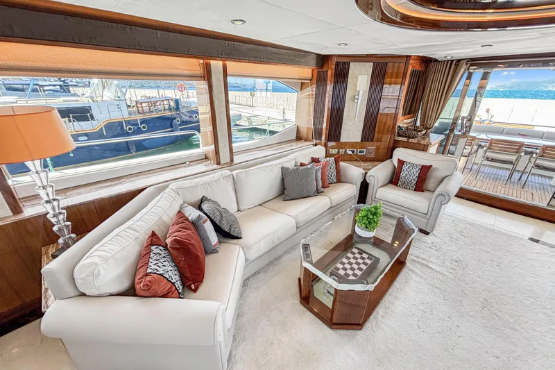  Yacht Photos Pics Luxurious interior of 2010 Sunseeker 30 Metre Yacht with elegant seating and ocean view.