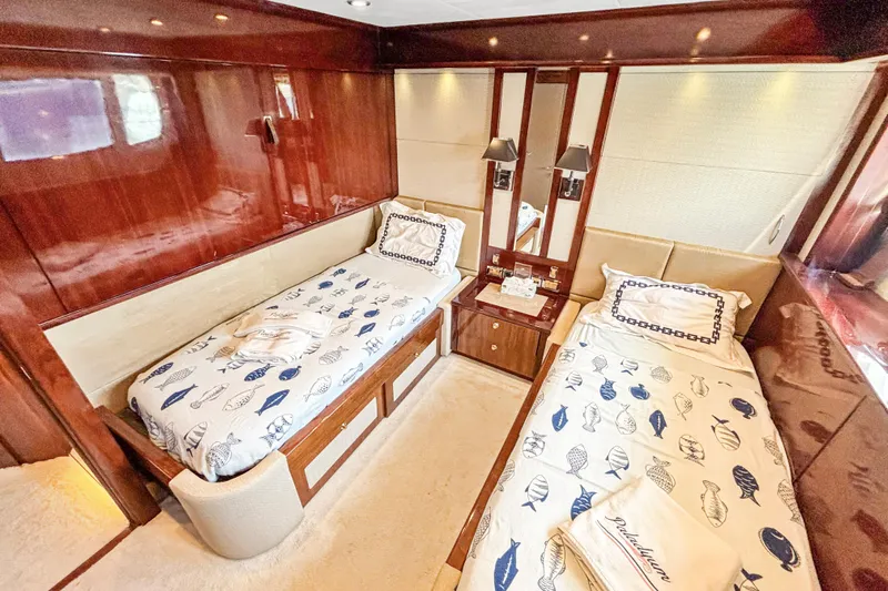  Yacht Photos Pics Luxurious twin cabin on 2010 Sunseeker 30 Metre Yacht with elegant wood finishes.